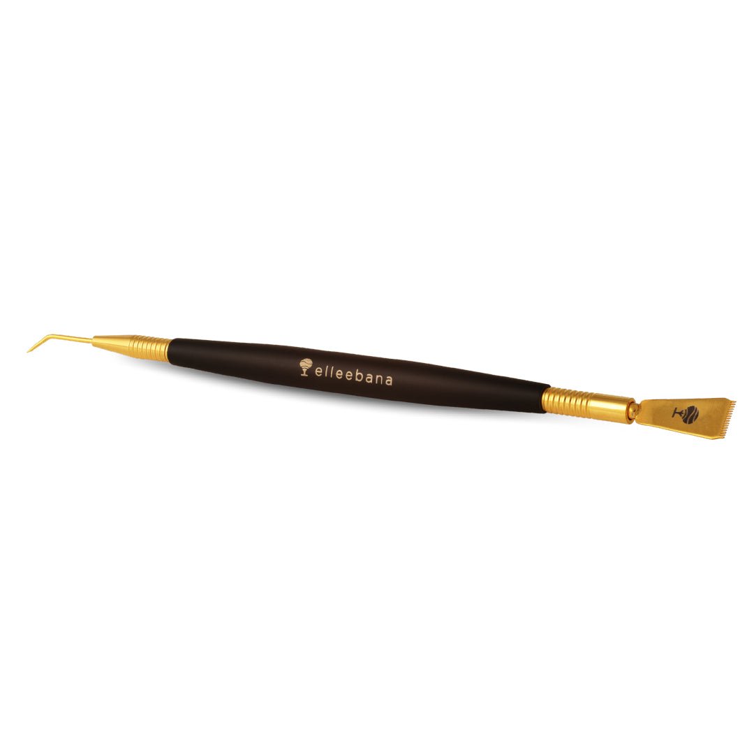 Lash technician using the fine comb end of the Elleebana Gold Precision Lifter Tool to align and separate natural lashes on a shield.