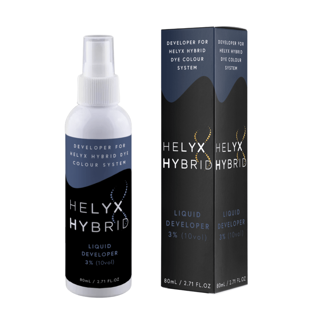 Side-by-side comparison of Helyx Hybrid Dye Liquid Developer bottles for lash and brow hybrid dye mixing.