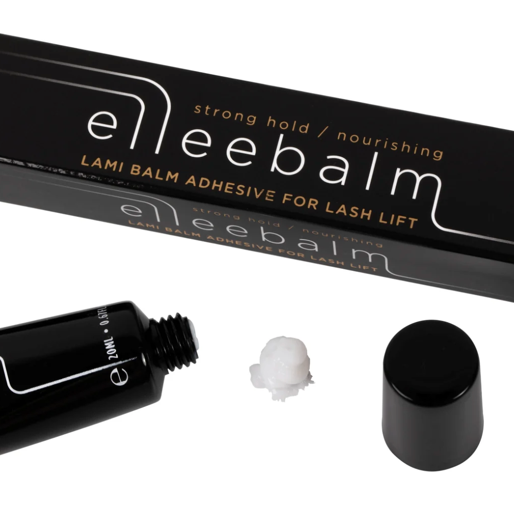Elleebalm Lami Balm Adhesive for Lash Lift shown with its black packaging box, an open black tube, and a dollop of white adhesive on a white background.
