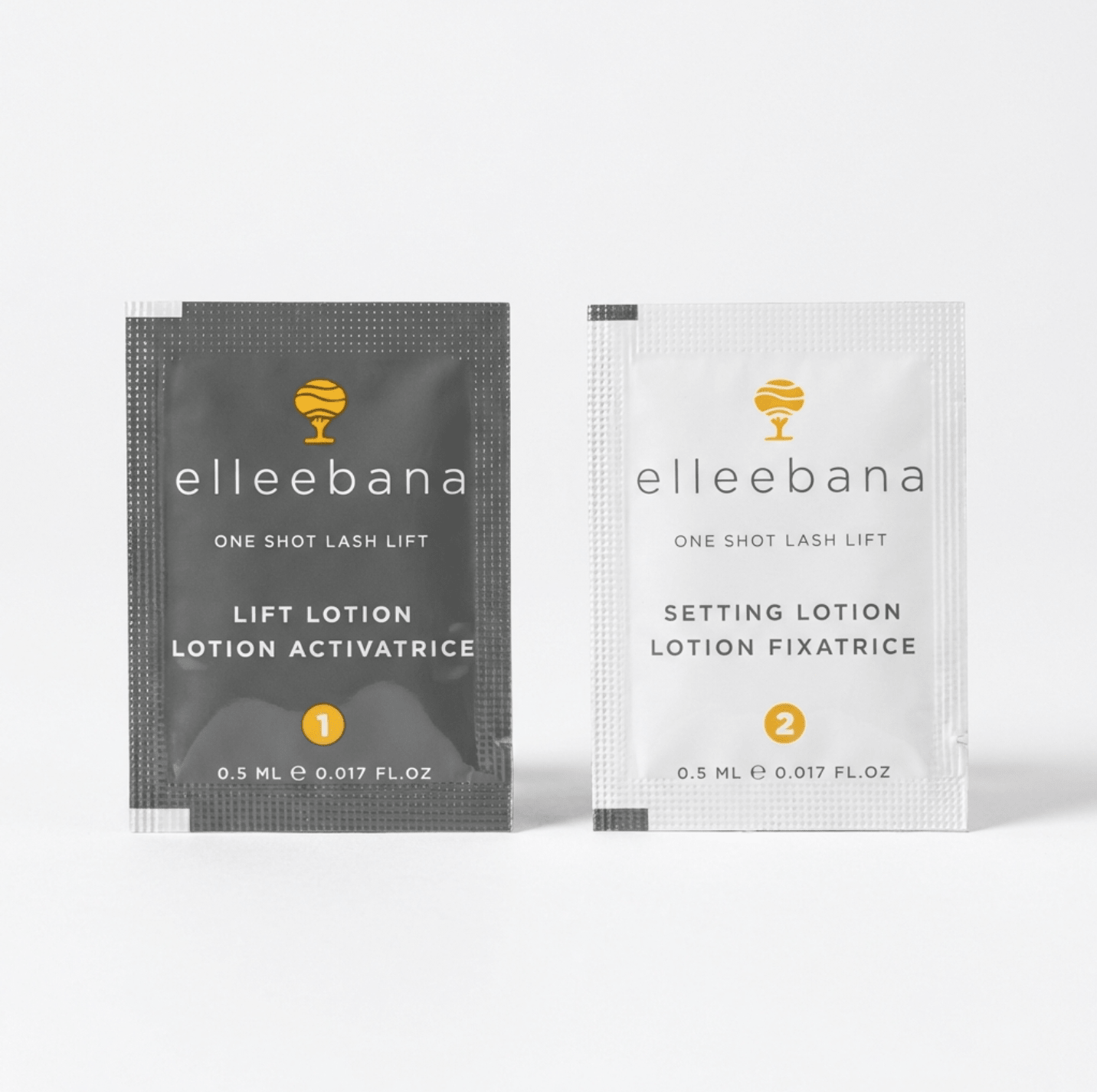 Close-up view of single-use Elleebana One Shot Step 1 Lift lotion and Step 2 Neutraliser setting sachets for Elleebana One Shot Lash Lift Trial Sample Pack