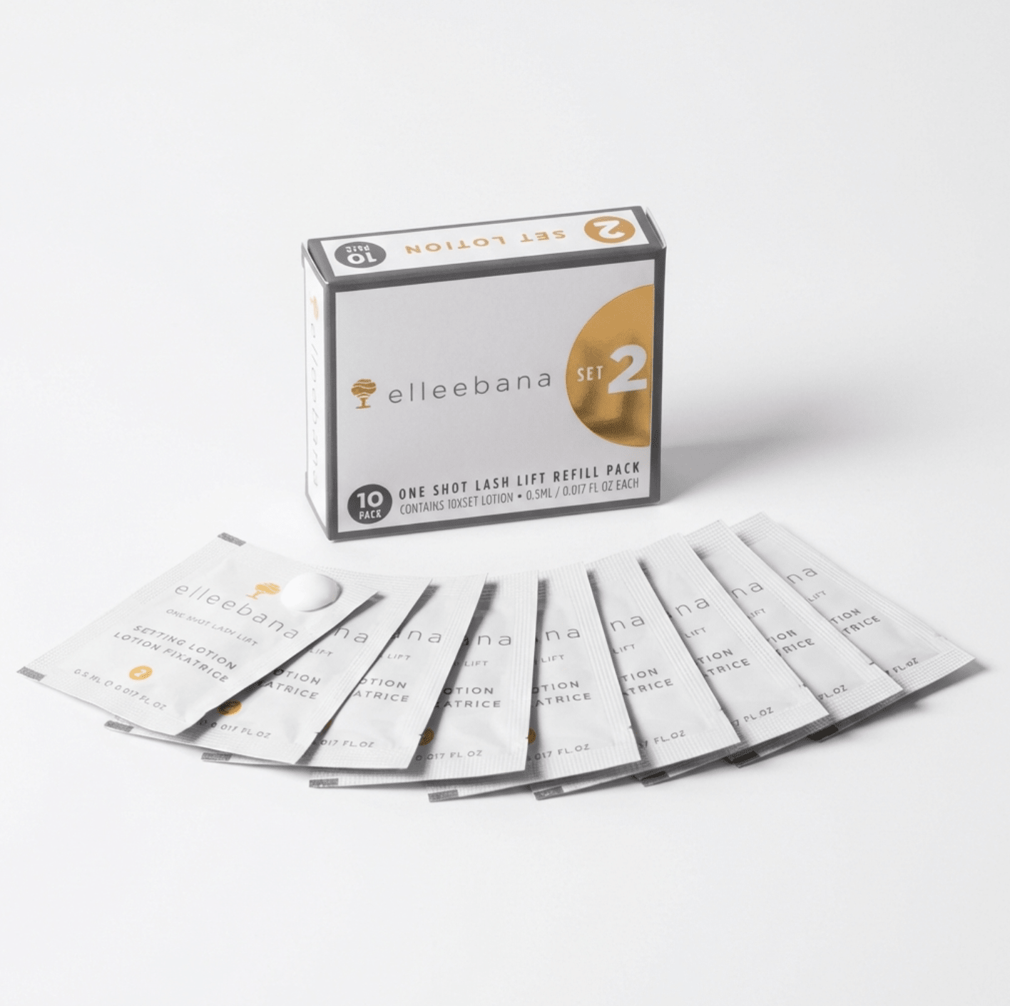 Close-up view of an individual Elleebana One Shot Lash Lift Step 2 setting lotion sachet designed to reform disulphide bonds.
